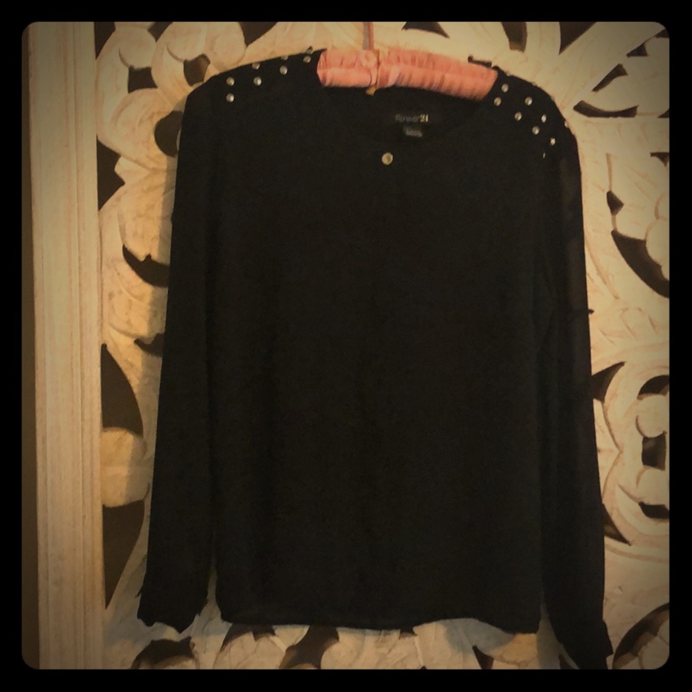 Sheer black top with shoulder details